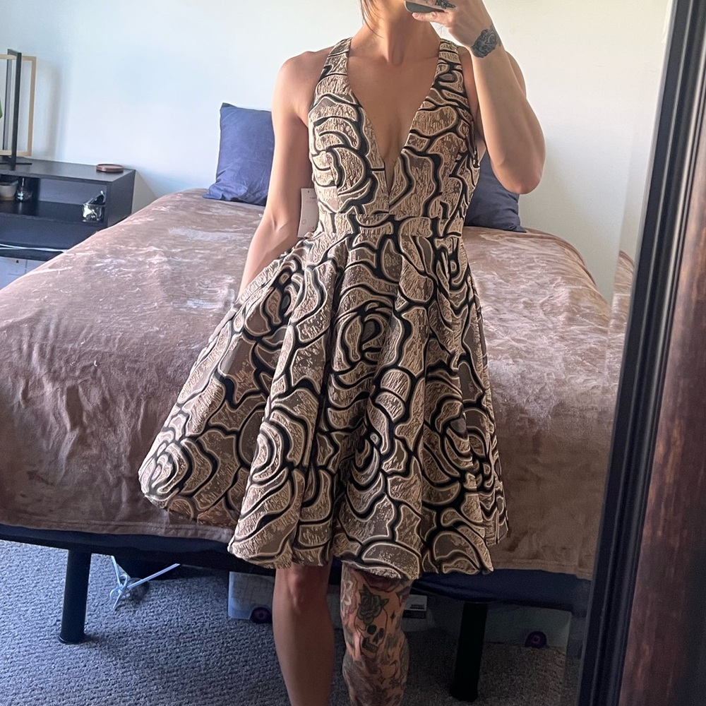 Chic Halter Dress with Black and Gold Pattern